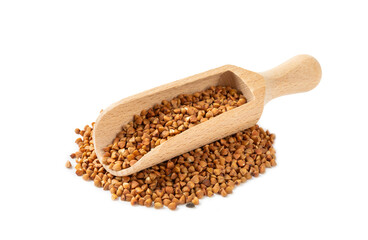 Buckwheat in wooden spoons. Buckwheat grain isolated on white background. Healthy food. Porridge....
