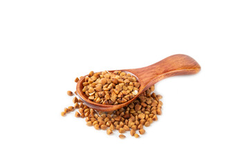 Buckwheat in wooden spoons. Buckwheat grain isolated on white background. Healthy food. Porridge. Diet. Organic cereal