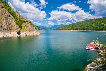 Pitoresque lake scene in summer Romanian Carpathians - 703418016