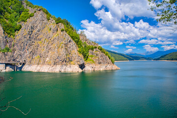 Green mountain lake in summer scene - 703418025