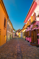 Colorful houses on a medieval street - 703418053