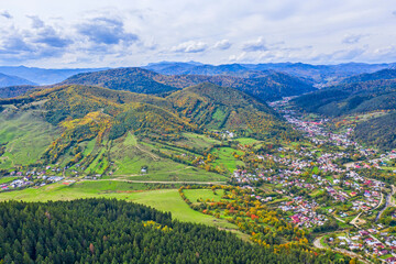 Mountain village, aerial scene during autumn - 703418291