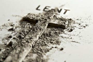 Ash wednesday. Lent word written in ash, dust as fast and abstinence period concept.