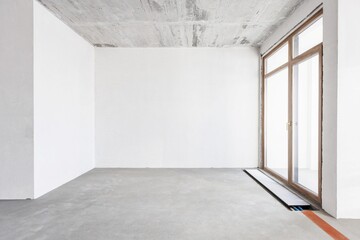 interior of the apartment without decoration in gray colors. rough finish