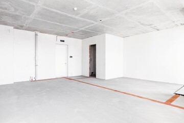 interior of the apartment without decoration in gray colors. rough finish