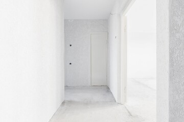 interior of the apartment without decoration in gray colors. rough finish
