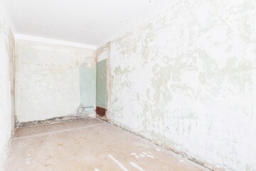 interior of the apartment without decoration in gray colors. rough finish