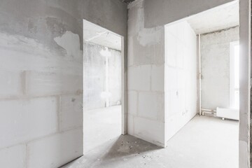 interior of the apartment without decoration in gray colors. rough finish