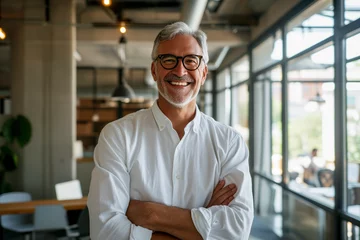 Deurstickers Confident Mature Business Leader: Smiling Middle-Aged Executive bank manager or investor, happy middle aged business man boss ceo standing in office, in Office Portrait © GustavsMD