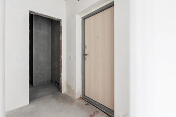 interior of the apartment without decoration in gray colors. rough finish