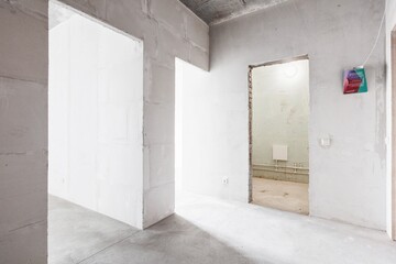 interior of the apartment without decoration in gray colors. rough finish
