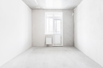 interior of the apartment without decoration in gray colors. rough finish
