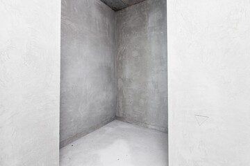 interior of the apartment without decoration in gray colors. rough finish