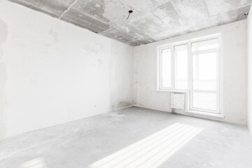 interior of the apartment without decoration in gray colors. rough finish