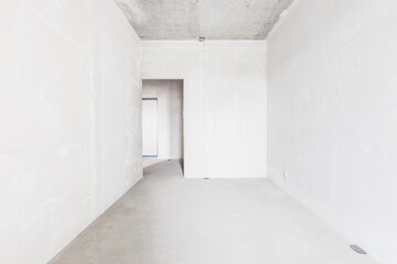interior of the apartment without decoration in gray colors. rough finish