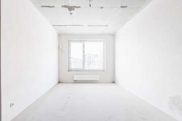 interior of the apartment without decoration in gray colors. rough finish