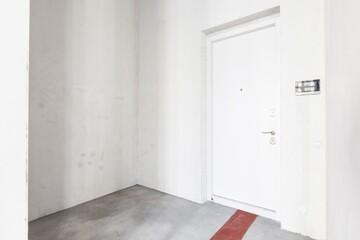 interior of the apartment without decoration in gray colors. rough finish