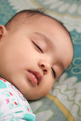 cute Indian little child sleeping close up