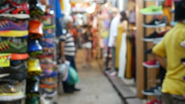 Shopping at Chatuchak Weekend Market, Bangkok. It is also known as JJ Market. This is a must-visit place for tourists. It is one of largest outdoor markets in the world with 15,000 stalls and shops. 