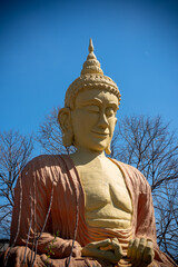 Buddha Statue In Thailand in A Sunny Day
