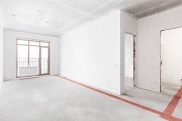 interior of the apartment without decoration in gray colors. rough finish