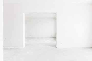 interior of the apartment without decoration in gray colors. rough finish