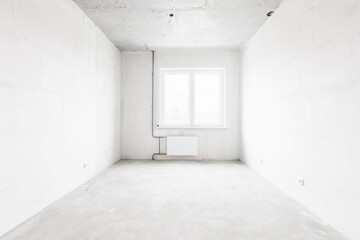 interior of the apartment without decoration in gray colors. rough finish
