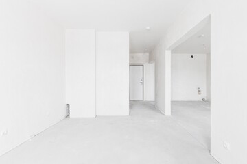 interior of the apartment without decoration in gray colors. rough finish