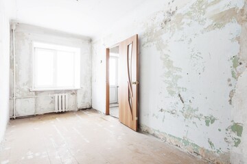 interior of the apartment without decoration in gray colors. rough finish