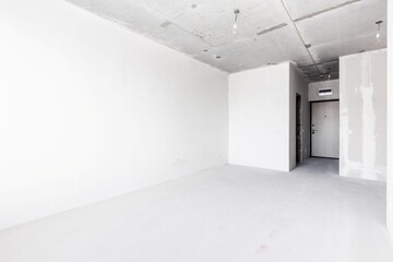 interior of the apartment without decoration in gray colors. rough finish