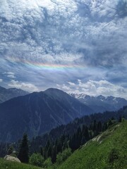 Obraz premium Rainbow over the mountains