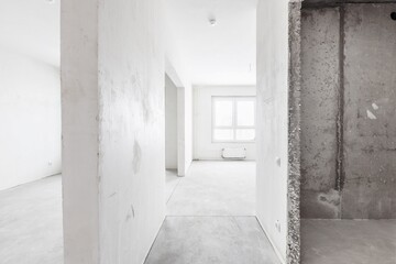 interior of the apartment without decoration in gray colors. rough finish