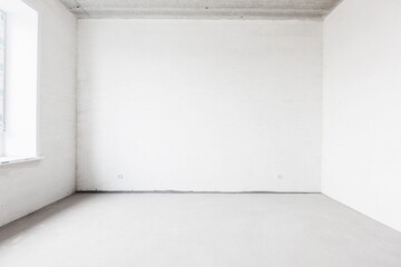 interior of the apartment without decoration in gray colors. rough finish