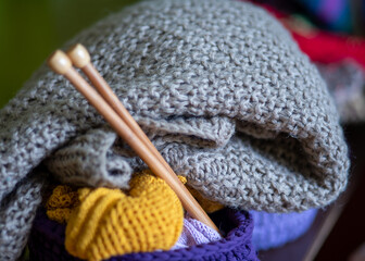 unfinished knitted work, needlework concept, homemaker's work, knitting as a hobby, hobby as needlework