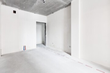 interior of the apartment without decoration in gray colors. rough finish