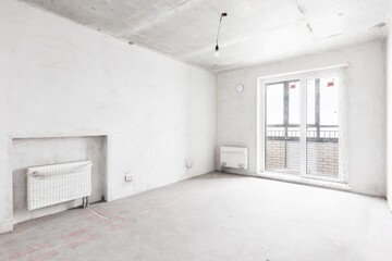 interior of the apartment without decoration in gray colors. rough finish