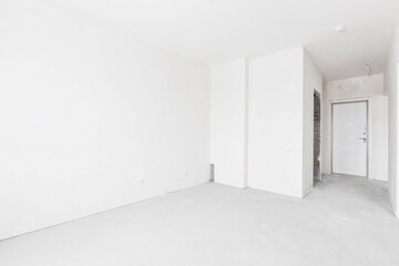 interior of the apartment without decoration in gray colors. rough finish