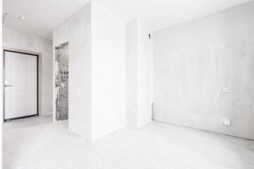 interior of the apartment without decoration in gray colors. rough finish