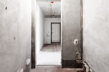 interior of the apartment without decoration in gray colors. rough finish