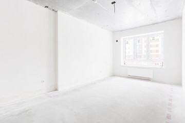 interior of the apartment without decoration in gray colors. rough finish
