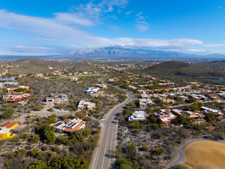 Aerial view of Mt Kimball and Mt Lemmon in Santa Catalina Mountains with Sonoran Desert landscape from Saguaro National Park in city of Tucson, Arizona AZ, USA.  - obrazy, fototapety, plakaty