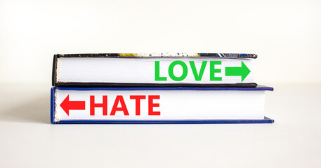 Love or hate symbol. Concept word Love or Hate on beautiful books. Beautiful white table white background. Business and love or hate concept. Copy space.