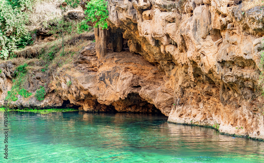 Wall mural Ain Sahlanout is a picturesque water spring located in the Sultanate of Oman