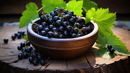 Fresh Black Currants in Wooden Bowl