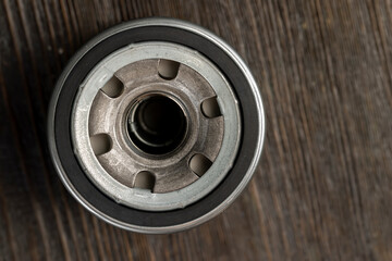 new oil filter for cleaning the oil in the car engine