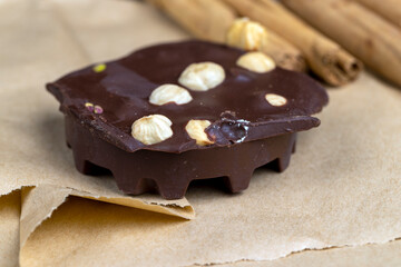 homemade black chocolate with cinnamon and nuts