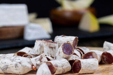 delicious sliced cheese with edible white mold
