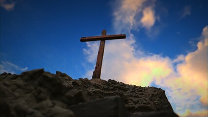 A sunny, beautiful sunrise/sunset at Golgotha on Easter morning featuring three crosses.