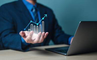 business, chart, graph, growth, success, analysis, diagram, digital, finance, investment. close up to hand of businessman, hold the bar chart from finance investment, then analysis that's diagram.