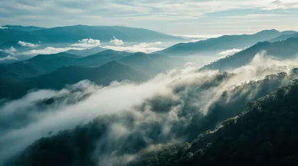 Foto op Plexiglas Mountain Mystique: A Symphony of Fog and Elevation © Nicolas